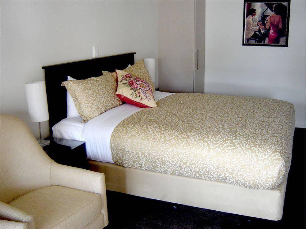 Salerno Motel Apartments Κράισττσερτς Εξωτερικό φωτογραφία A bed
